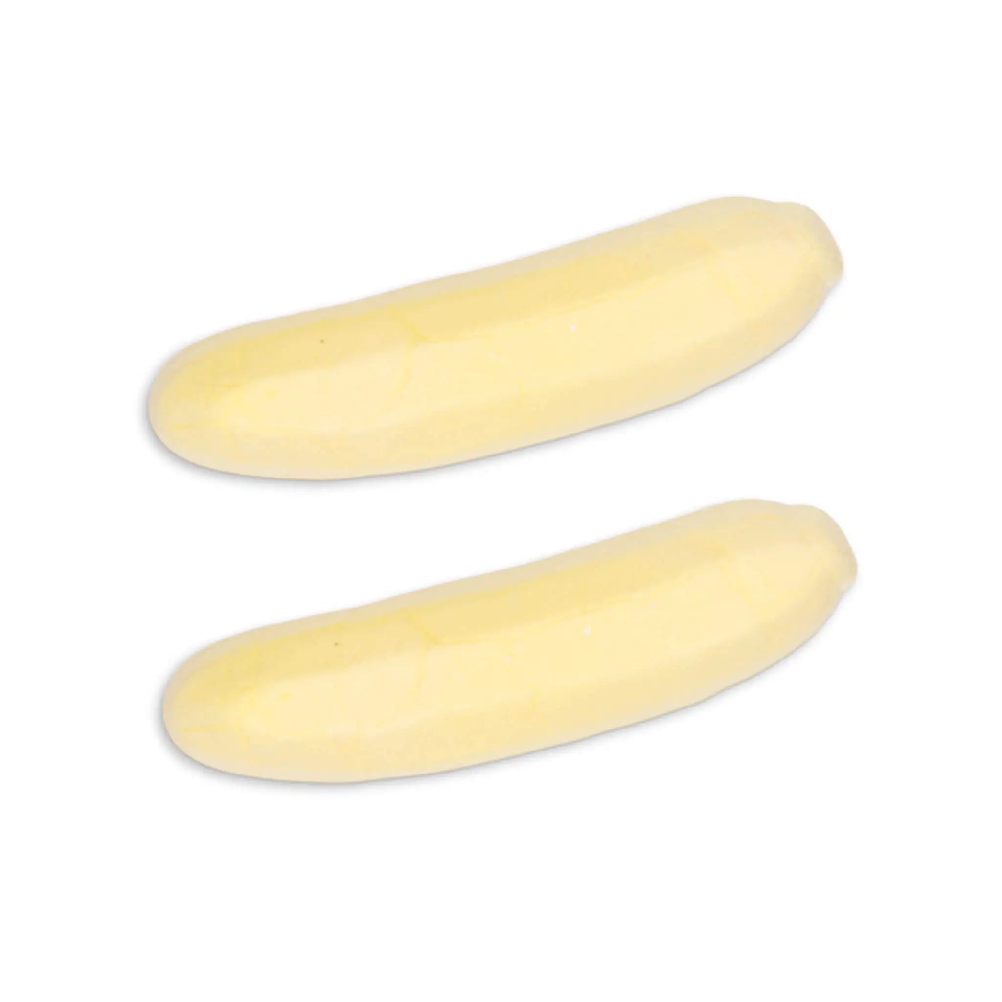 Two pieces of Swedish candy in the shape of bananas.