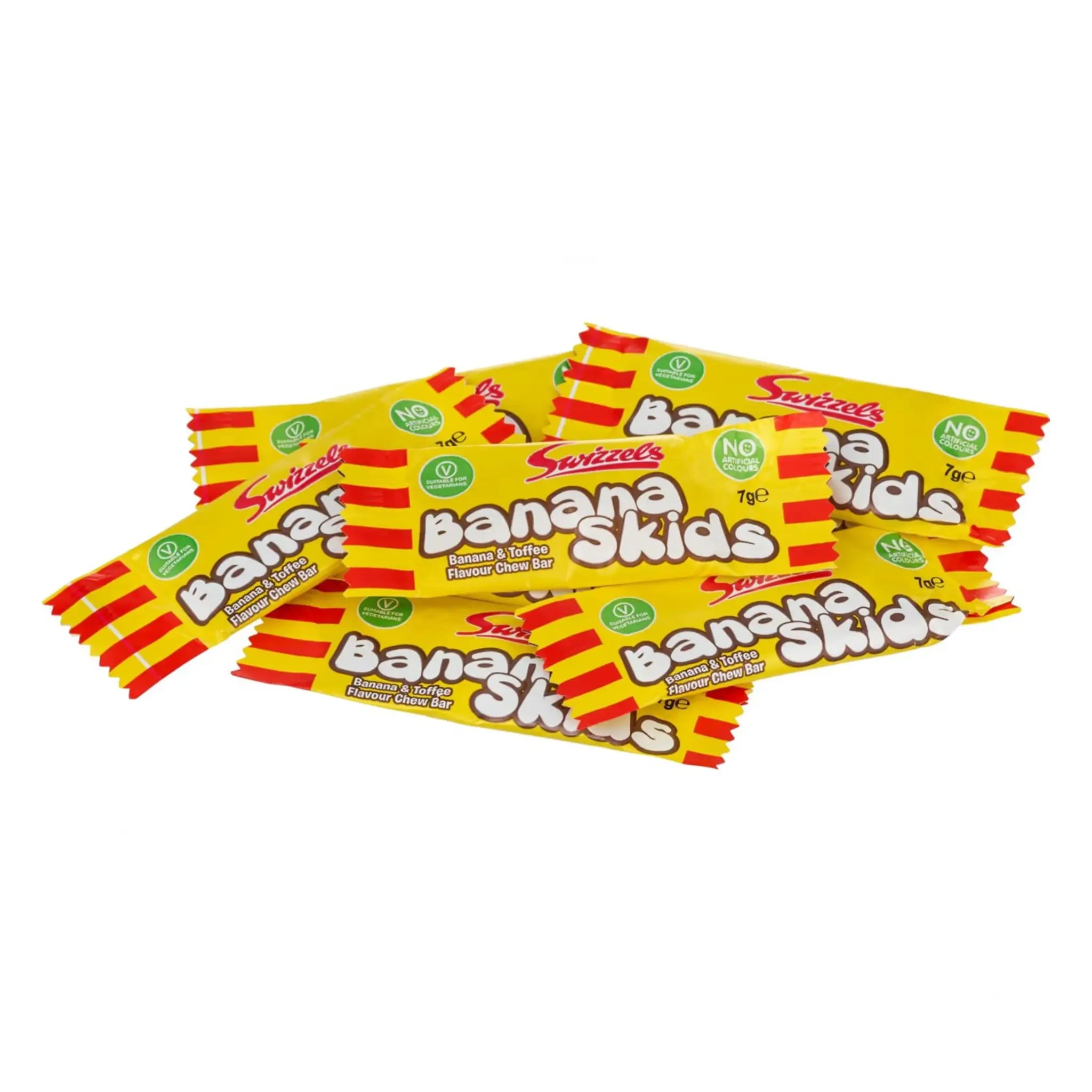 Six pieces of the candy Banana Skids wrapped in mainly yellow with mainly red and white details.
