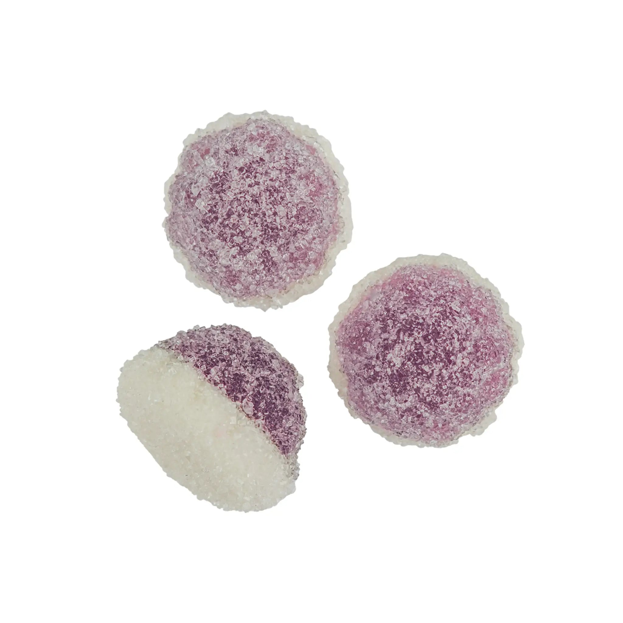 Three pieces of Swedish candy shaped like small pies in purple, with a white bottom, coated in sugar.