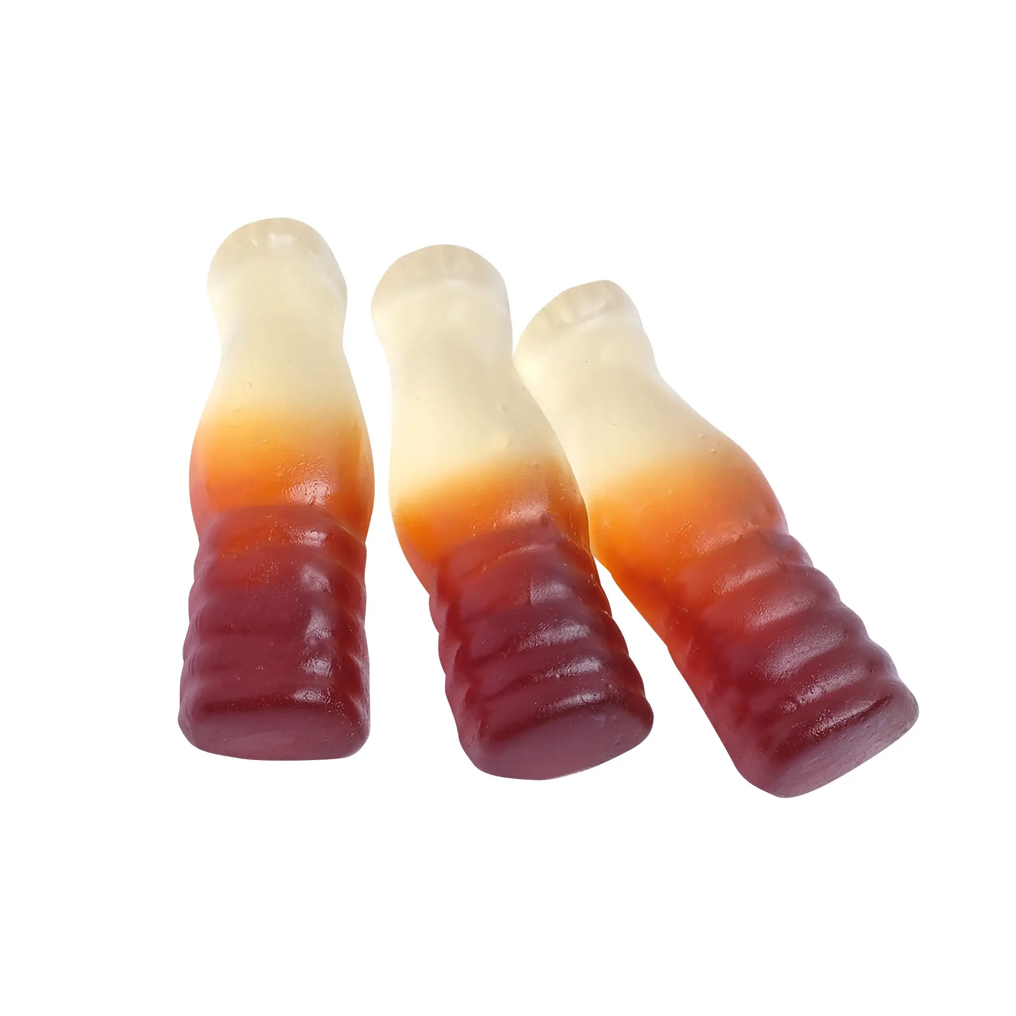 Candy in the shape of bottles, brown on the bottom and white on the top.