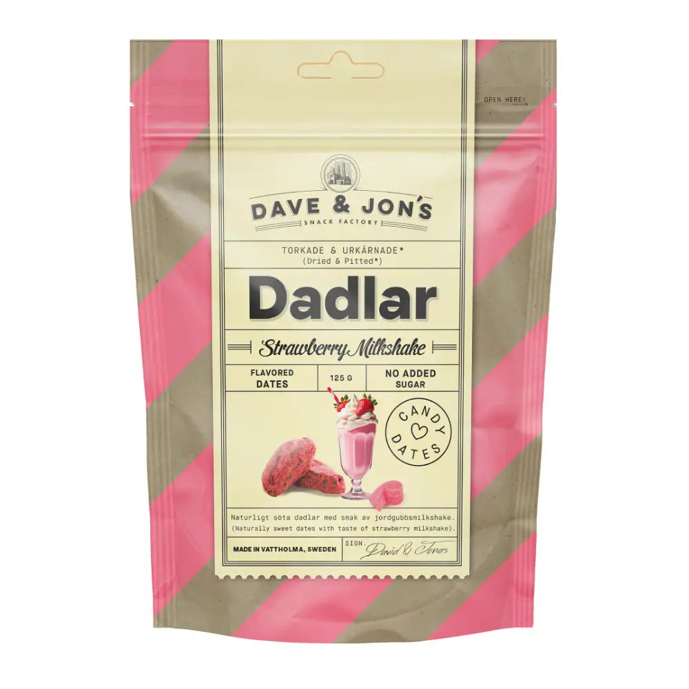 A beige bag with pink stripes, filled with dates with the taste of strawberry, and with a pink milkshake in the front under the word "Dadlar".