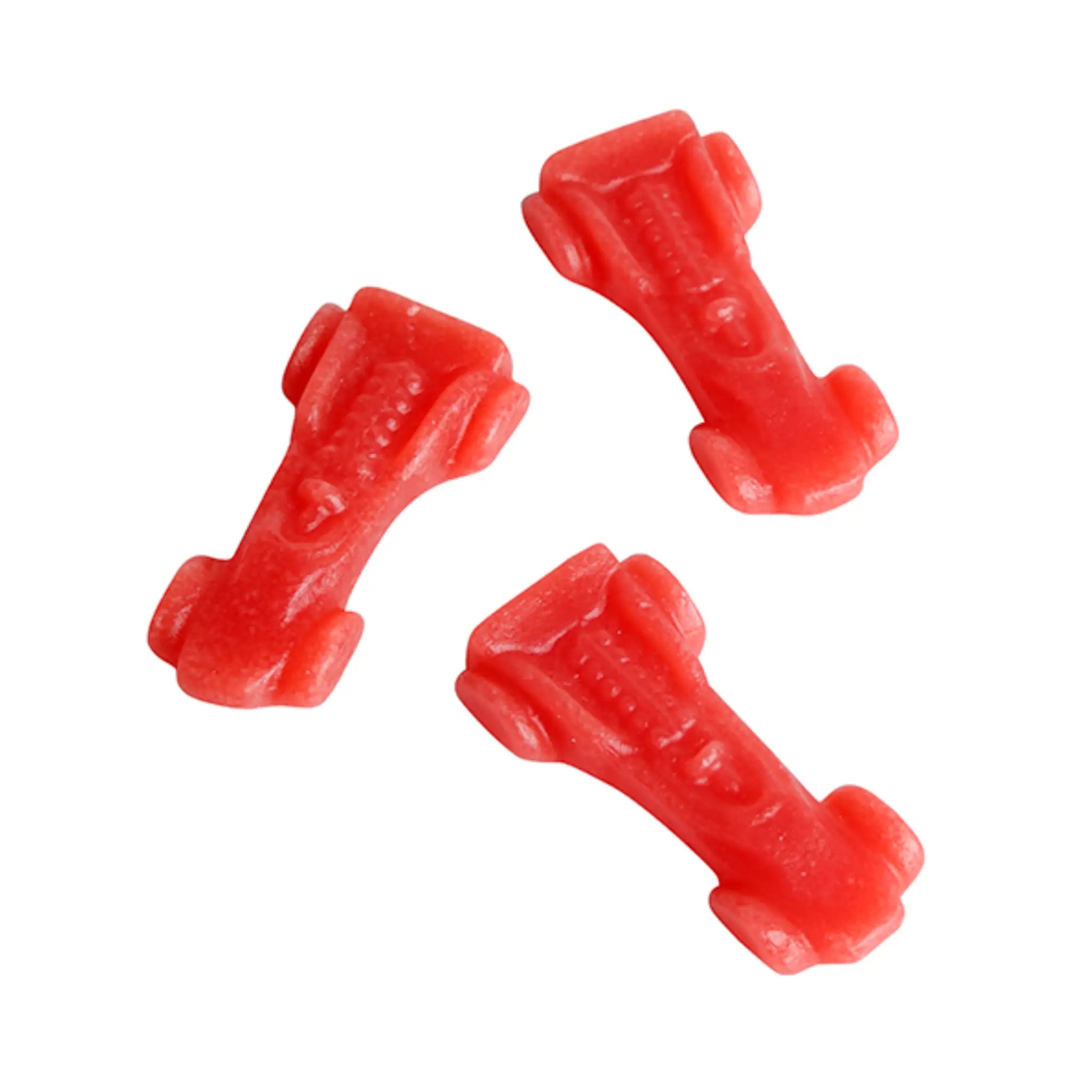 Three pieces of Swedish candy in red, shaped like Ferrari cars.
