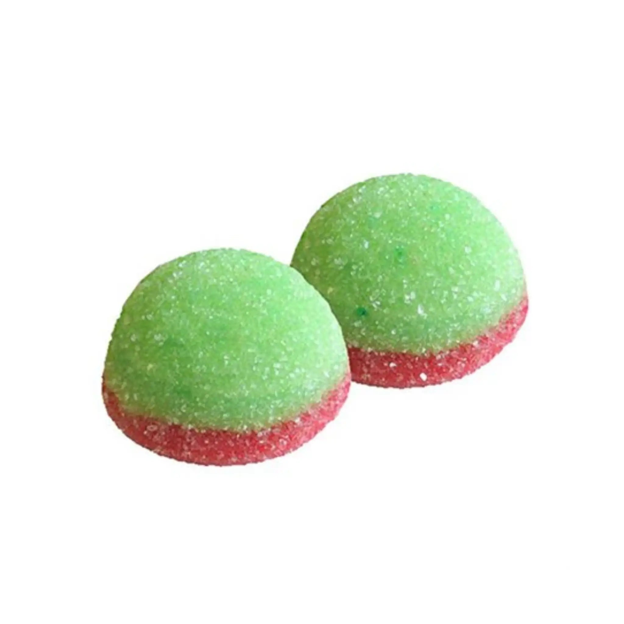 Two pieces of candy in the shape of balls, in green and a bit of red, coated in sugar.