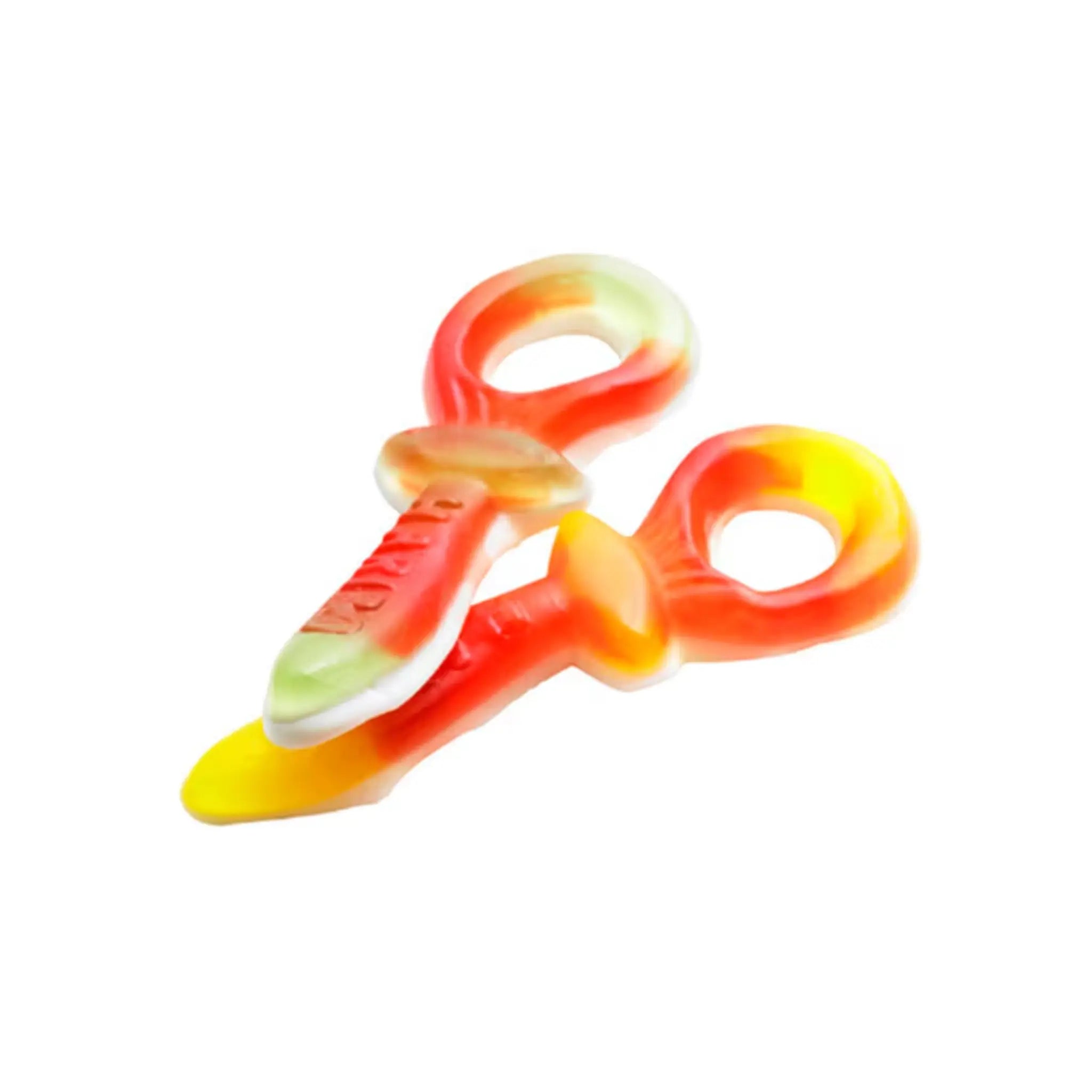 Two pieces of Swedish candy in the shape of pacifiers in mainly red, and green and yellow.