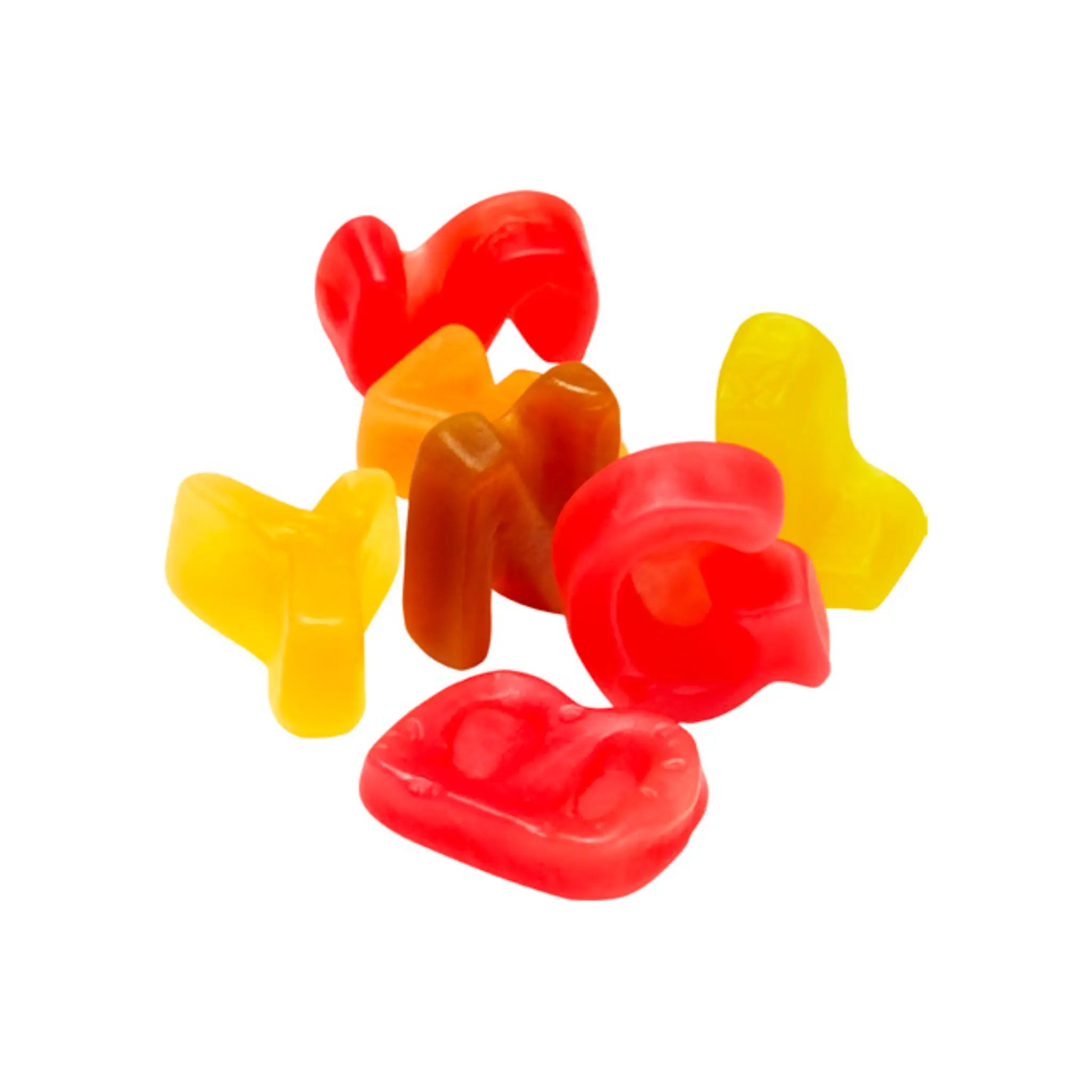 Swedish candy in the shape of letters, in red, brown, orange and yellow.