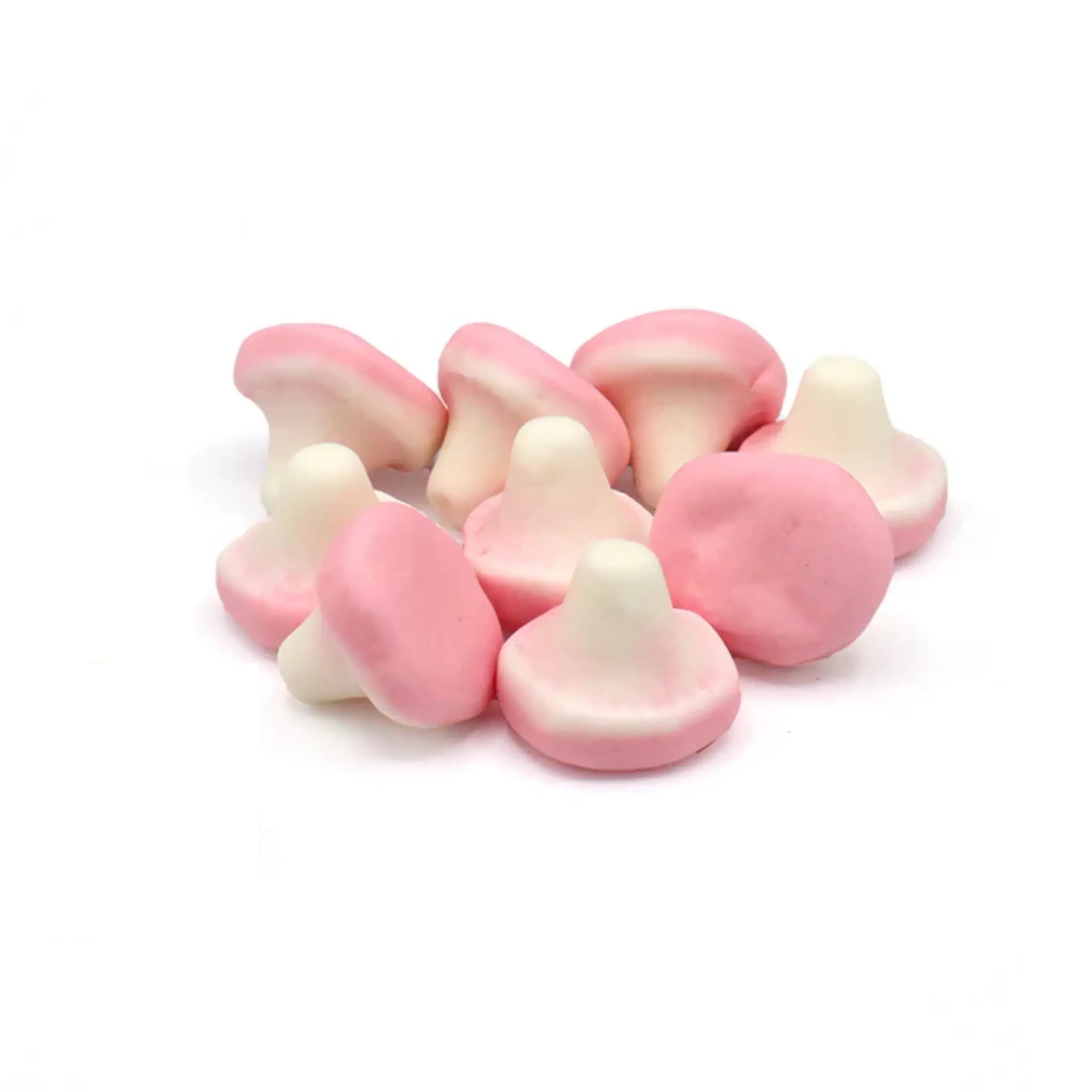 Swedish candy in the shape of mushrooms in white and pink.