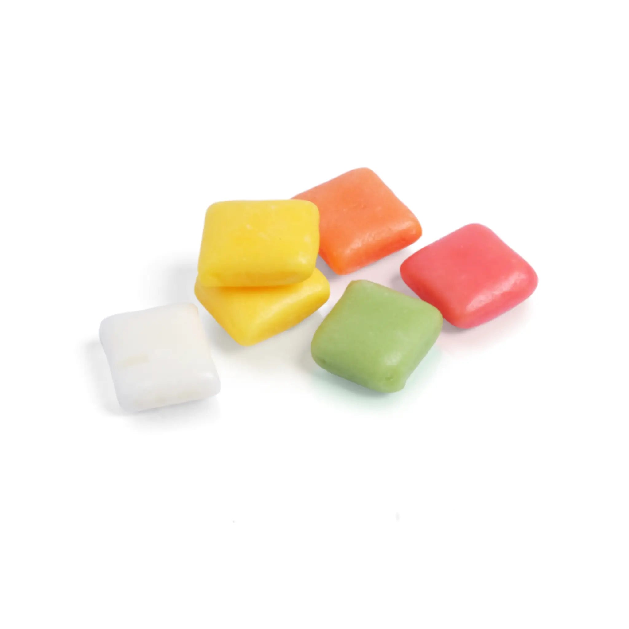 Six pieces of Swedish candy in square shape, in yellow, orange, green, pink and white.