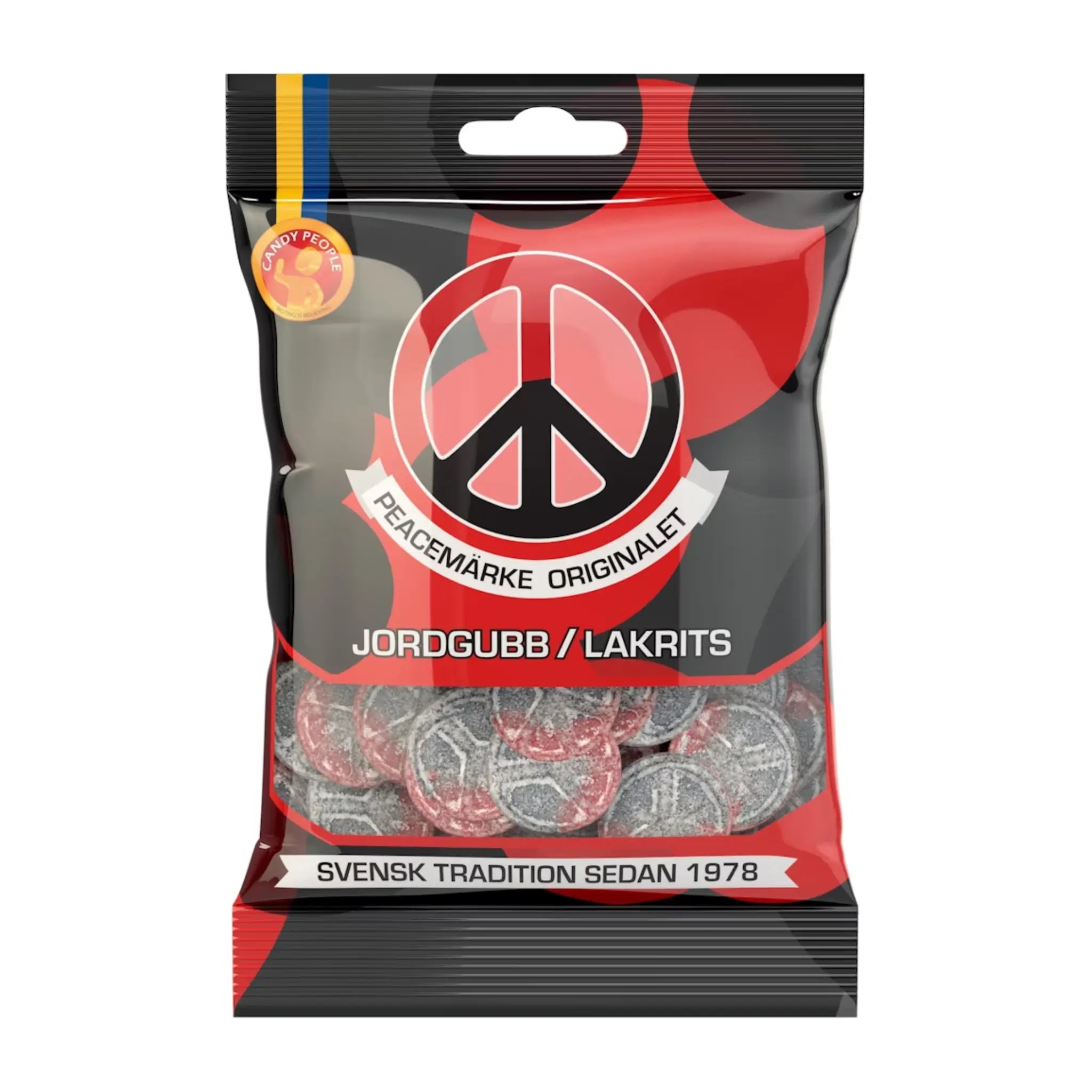 Swedish candy in a round shape in black and red, coated in sugar, wrapped around a bag in black and read.