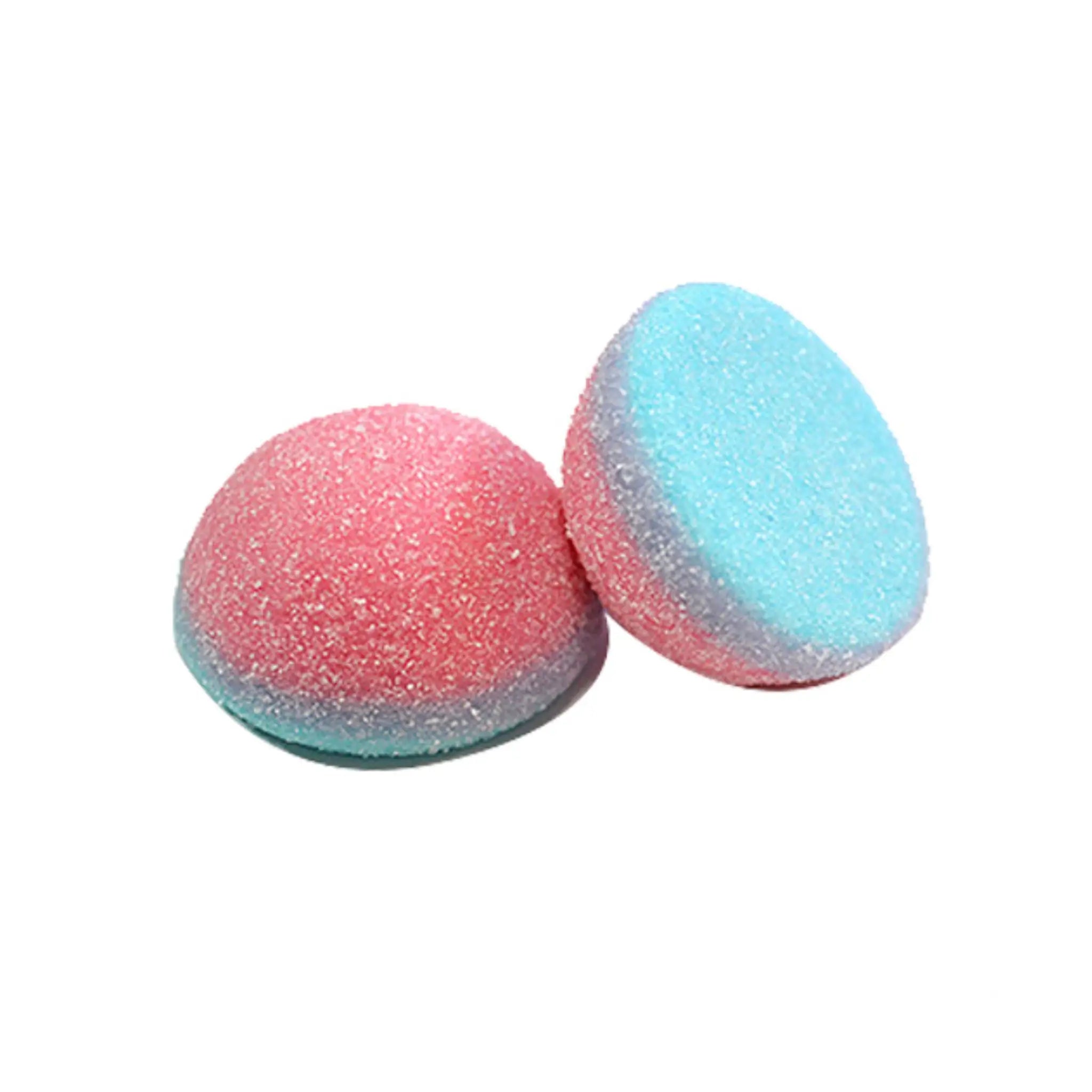 Two pieces of candy in the shape of balls, in blue and pink, coated in sugar.