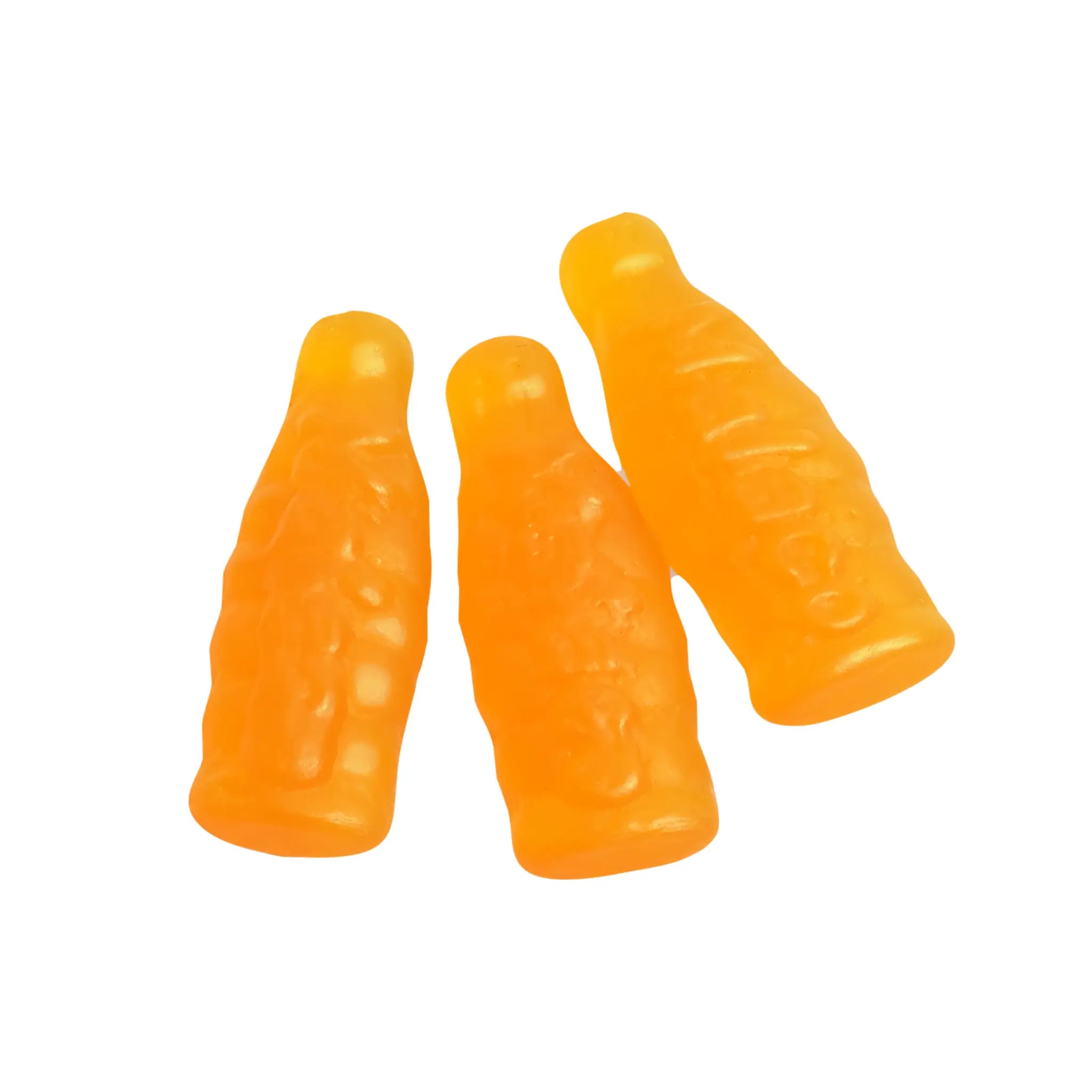 Three pieces of Swedish candy in the shape of bottles, in orange.