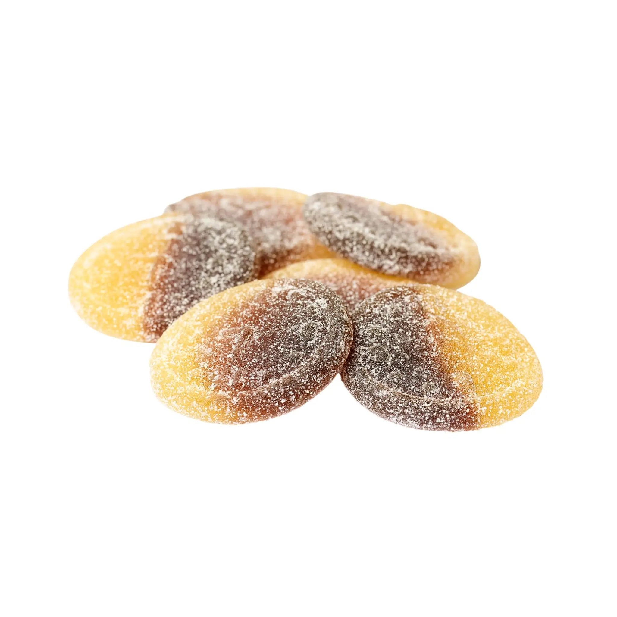 Multiple pieces of Swedish candy in the shape of circles, in yellow and brown, coated in sugar.