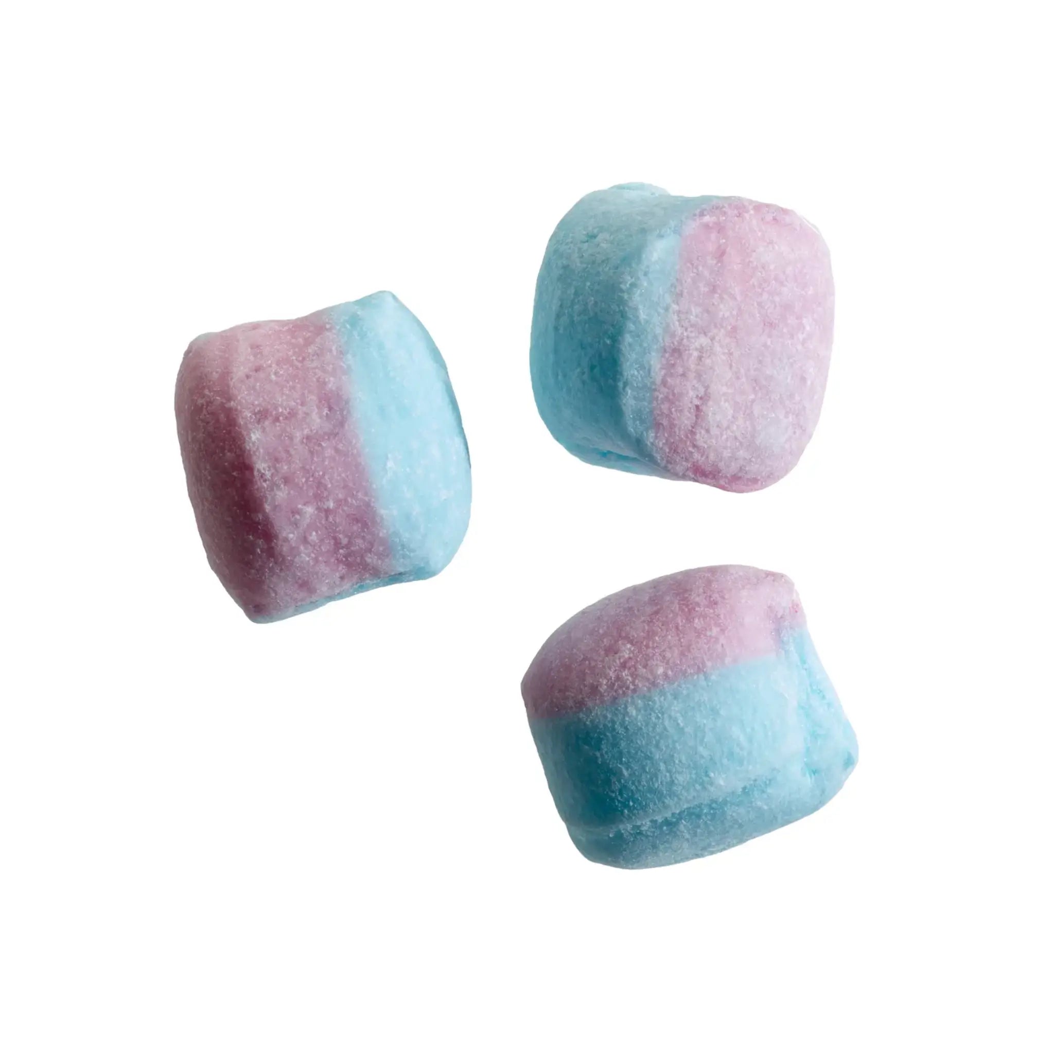 Three pieces of Swedish candy in the shape of rocks, half in pink and half in blue.