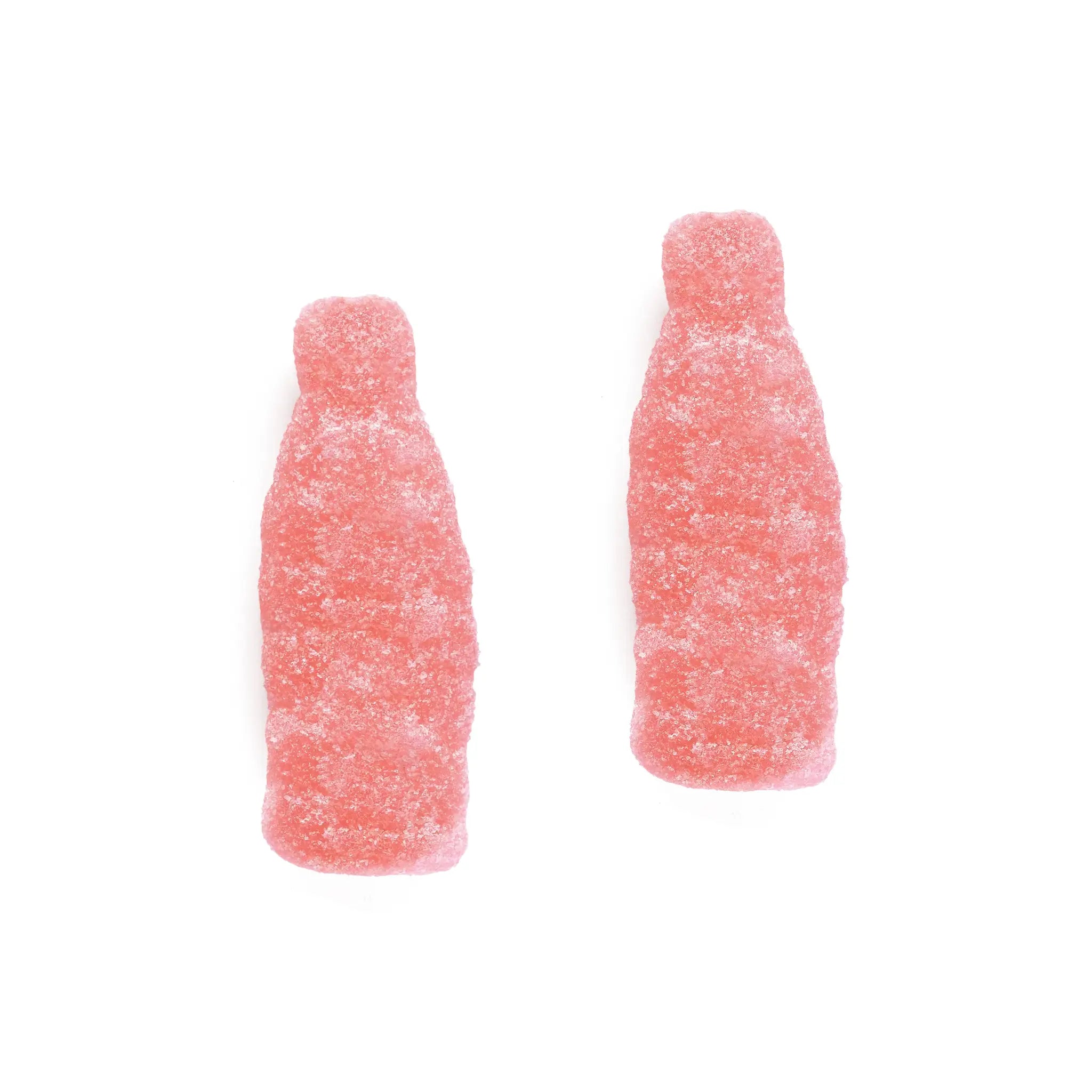 Two pieces of Swedish candy in the shape of pinked bottles, coated in sugar.