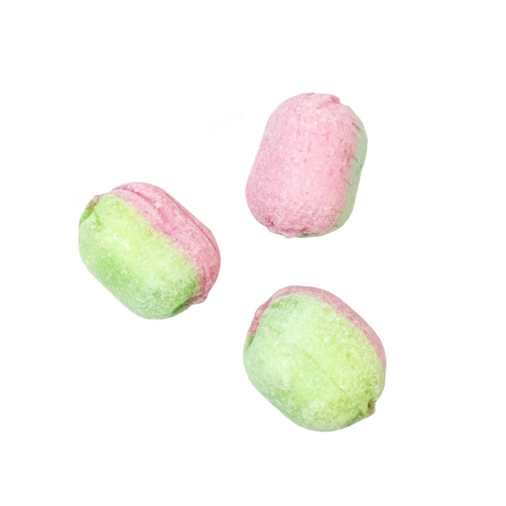 Three pieces of Swedish candy in pink and green, in the shape of water melons.