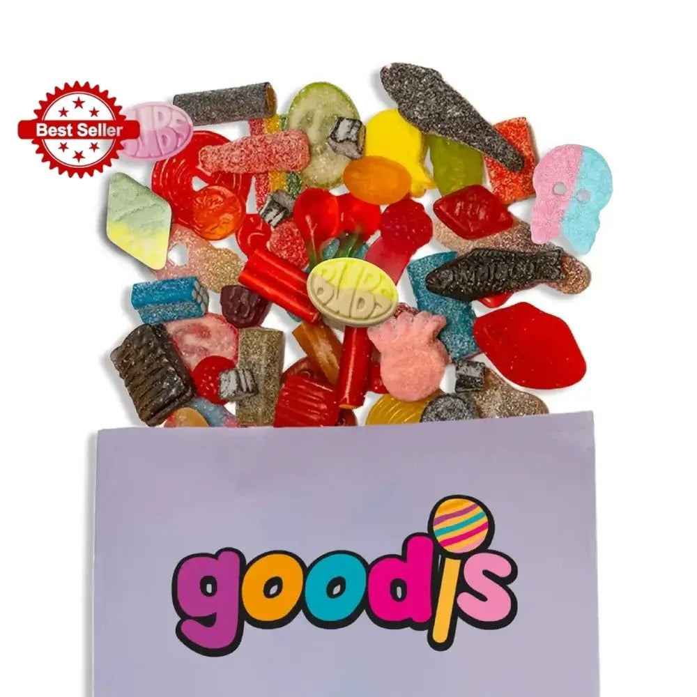 A mix of Swedish candy in different colors and shapes, popping out from a purple candy bag with the logo "Goodis" on it.