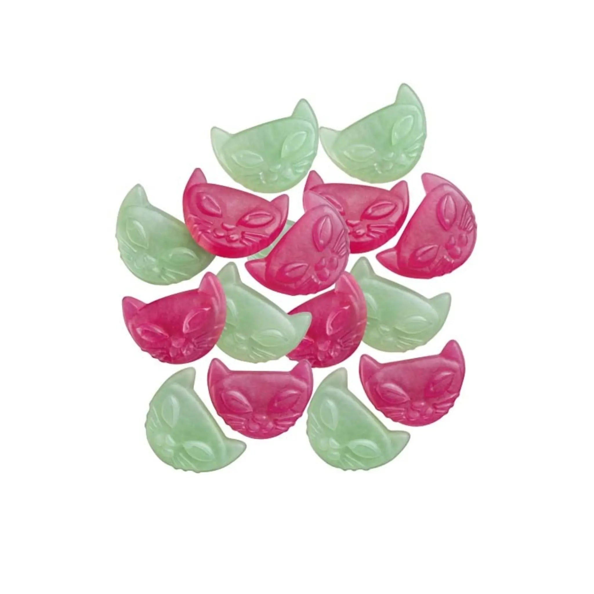 Multiple pieces of Swedish candy, in green and pink, shaped like cats heads.
