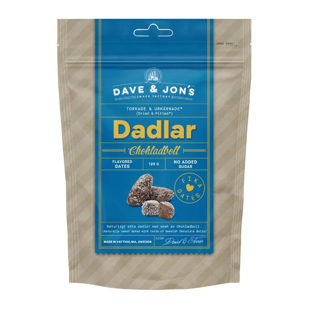 A beige and blue bag of dates, with the word "Dadlar" in yellow in the front", showing two dates and chocolate balls.