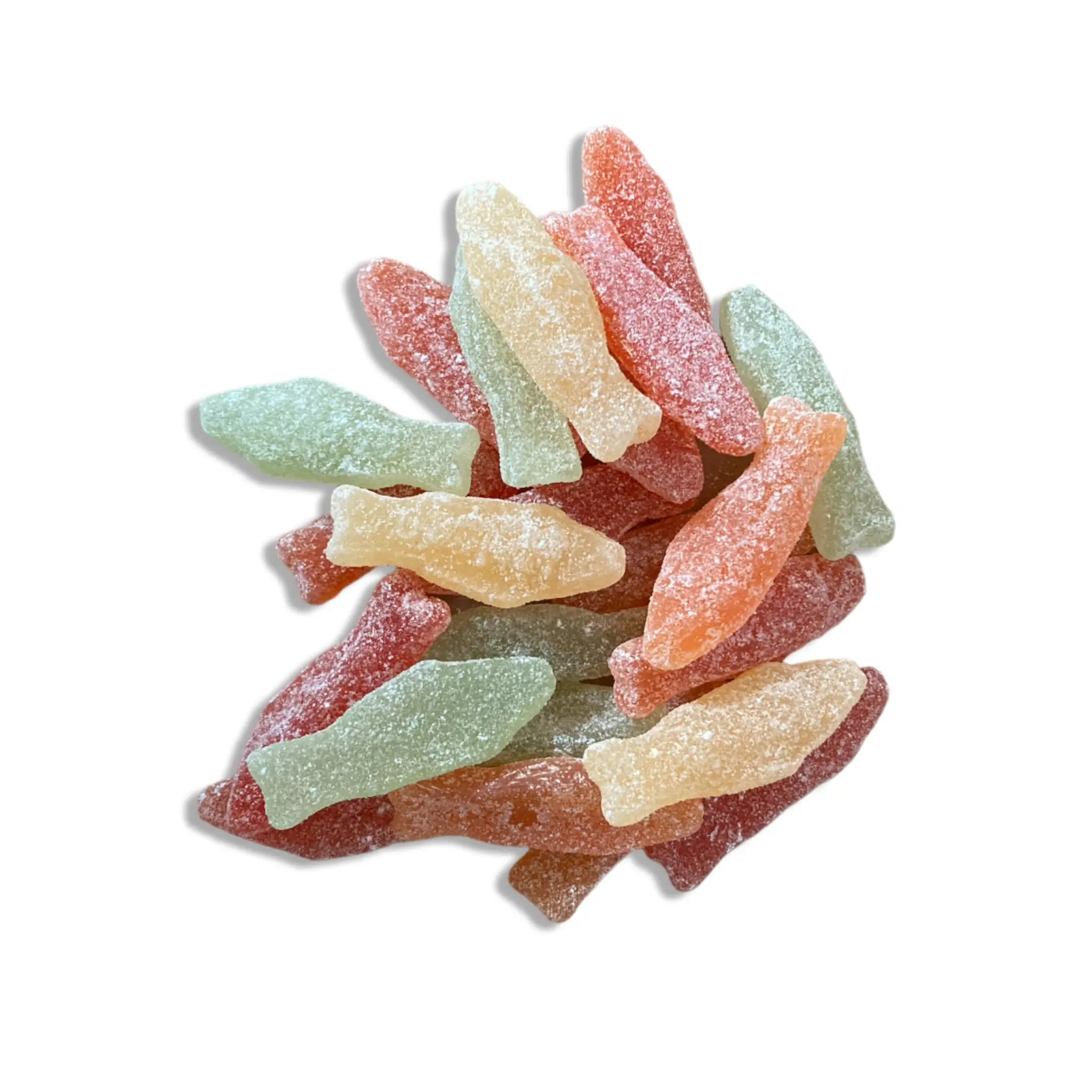 Swedish candy shaped like fishes in yellow, orange, red and green.